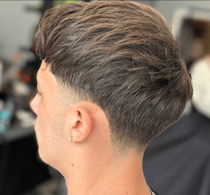 Textured crop with a precise low taper fade
